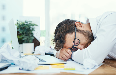 Buy stock photo Tired, man and sleeping on office desk with burnout, fatigue and overworked business employee with glasses, documents and laptop. Businessman, lawyer and exhausted sleep in company workplace