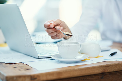 Buy stock photo Tea, sugar and hand of person in office with tech, preparation and hot drink in business. Finance employee, coffee or sweetener at desk for refreshment, caffeine addiction or morning on new day