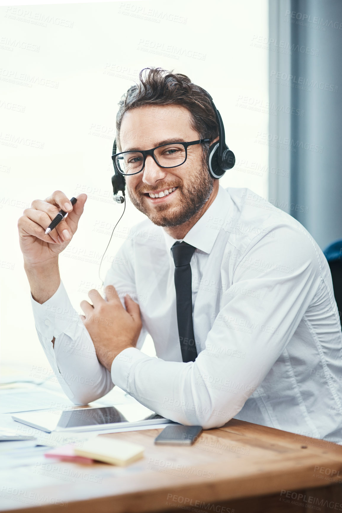 Buy stock photo Businessman, portrait and call center office with headset, help desk and friendly customer service for online advice. Tech support, telesales and communication, agent and consultation professional