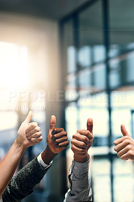 Buy stock photo Cropped shot of a group of unrecognizable businesspeople gesturing thumbs up