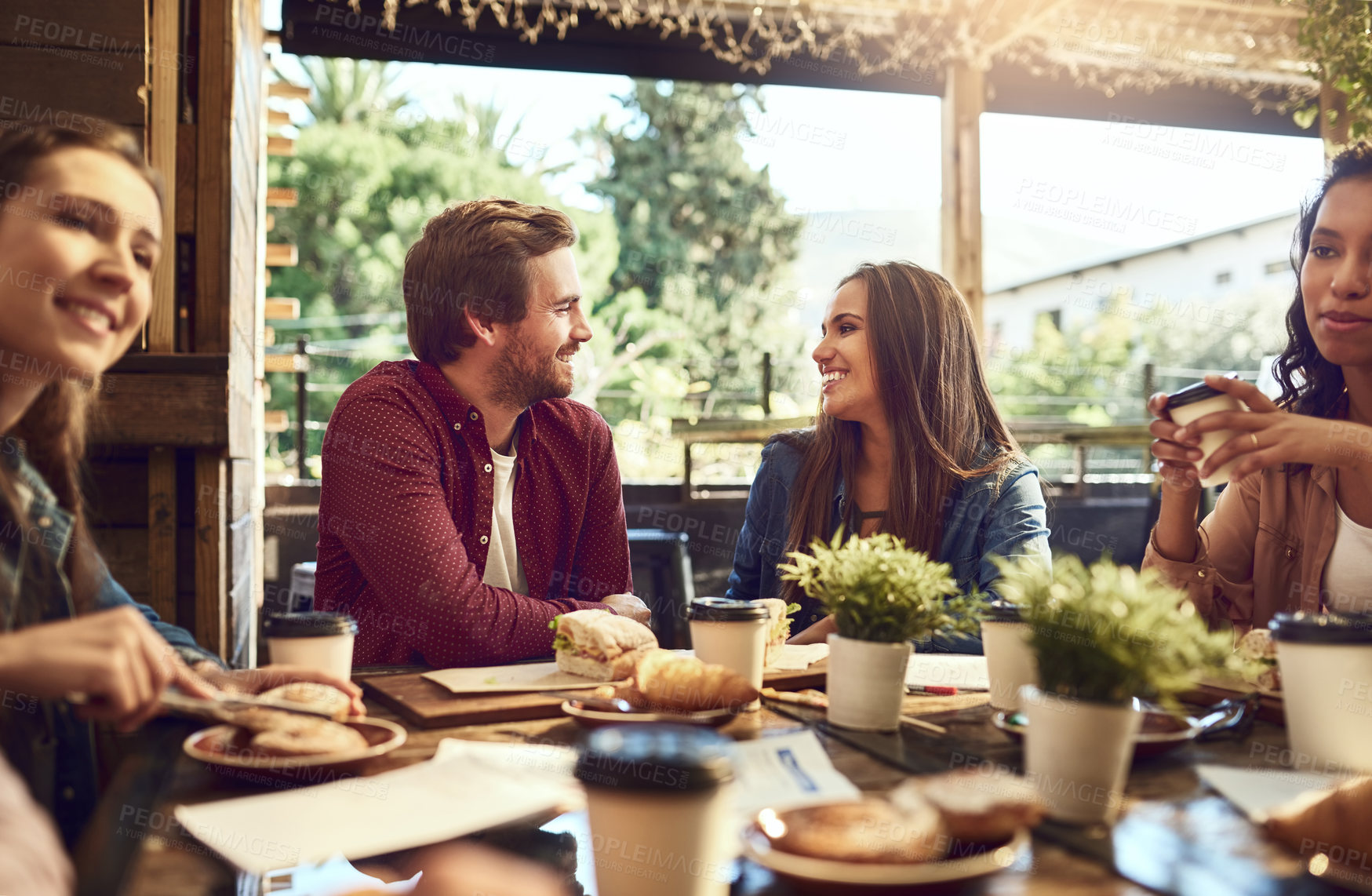 Buy stock photo Smile, friends and chat in restaurant for lunch, brunch and breakfast with conversation for hangout. People, man and women with happiness for social gathering, reunion and ready for eating in cafe