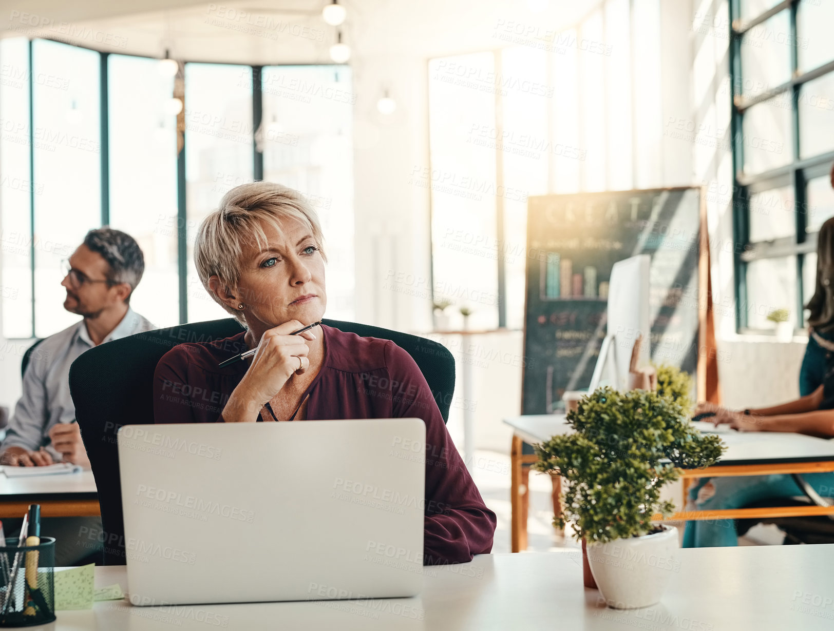 Buy stock photo Mature woman, designer and thinking with laptop for web design, ideas or improvement at office. Creative, female person or journalist in wonder for content creation, online service or startup