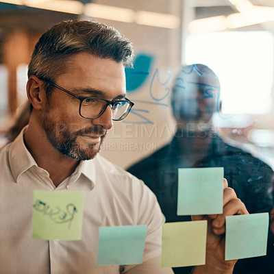 Buy stock photo Businessman, writing and planning in team brainstorming for schedule, tasks or strategy at office. Man employee in leadership, presentation or training staff in sticky note project plan at workplace