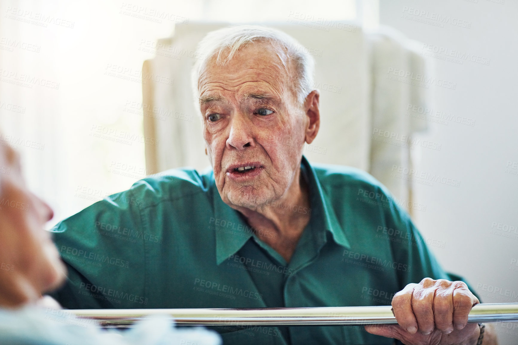 Buy stock photo Cropped shot of a senior man visiting his sick wife in hospital