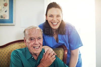 Buy stock photo Cropped portrait of a female nurse standing next to her senior male patient