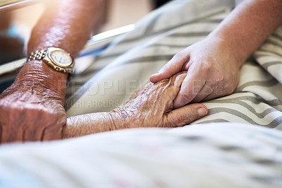 Buy stock photo Elderly person, hands and visit with hospital, closeup and senior care or love together. Elderly people, couple and relationship with medical checkup, help and empathy for surgery recovery and health