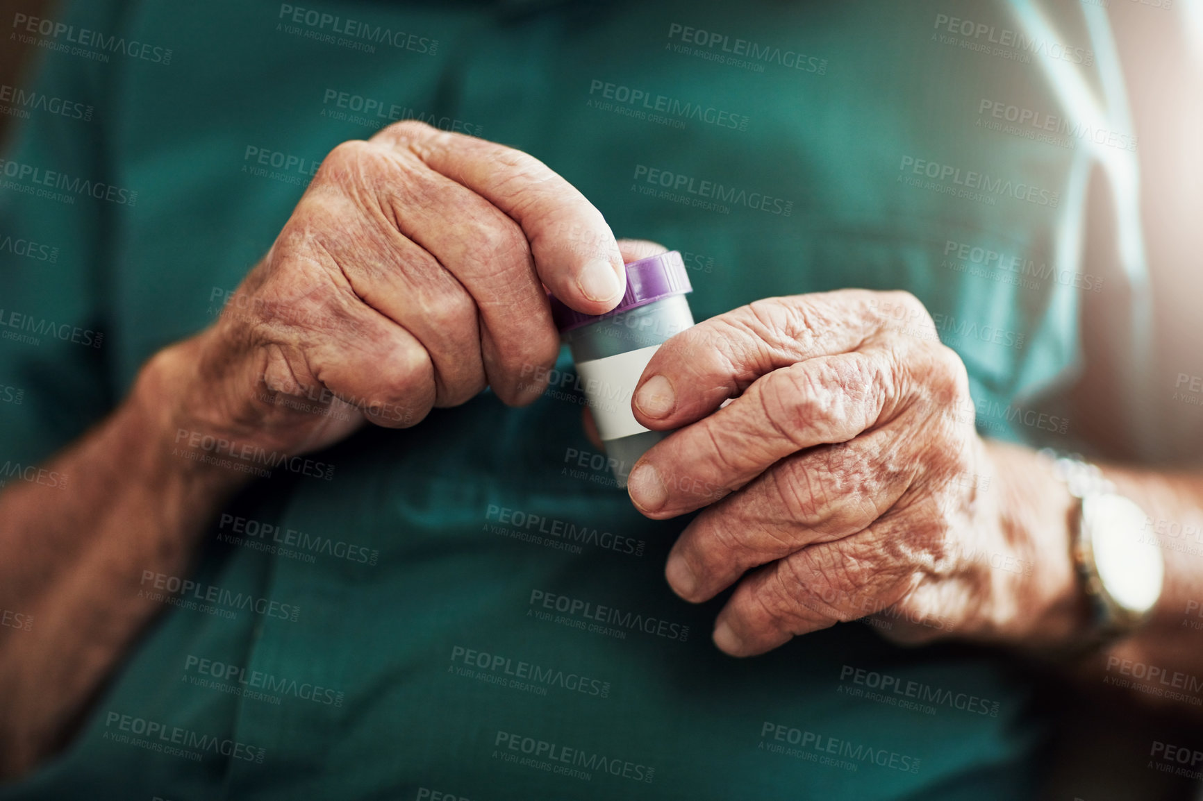 Buy stock photo Senior man, hands and medication with pills for prescription, chronic illness or sickness at old age home. Closeup of elderly male person with tablets in container for medical, dementia or arthritis