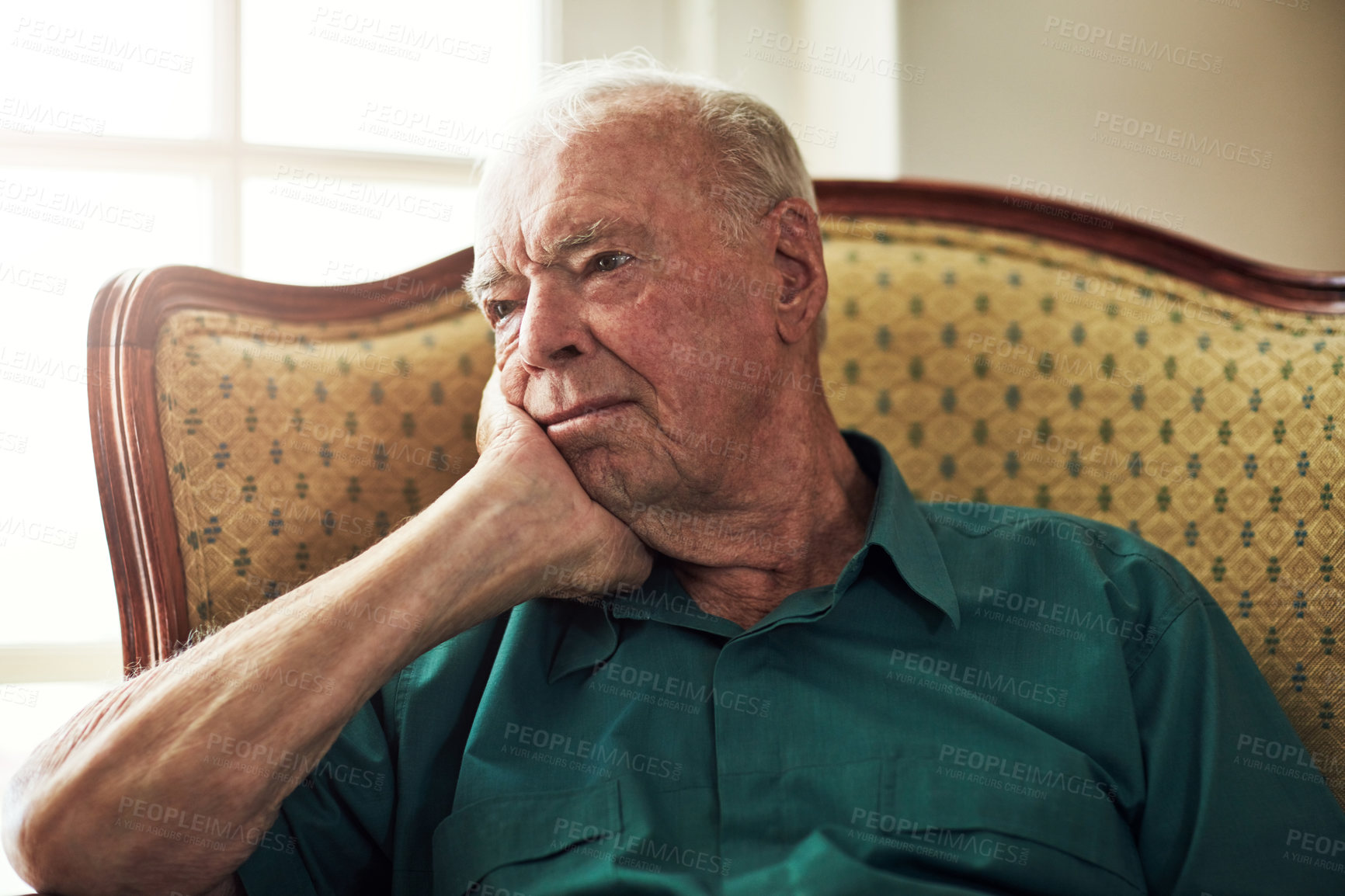 Buy stock photo Senior, man and sad with thinking of memory in retirement home with remember, lonely and reflection on sofa. Elderly, person and thoughtful with grief for depression, alzheimers or wondering on couch