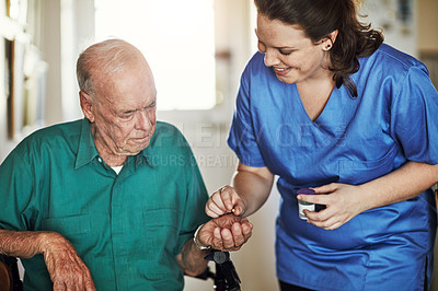 Buy stock photo Senior man, nurse and elderly care with pills, medication or prescription for daily dose or healthcare at old age home. Medical caregiver or woman volunteer giving tablets to person with a disability