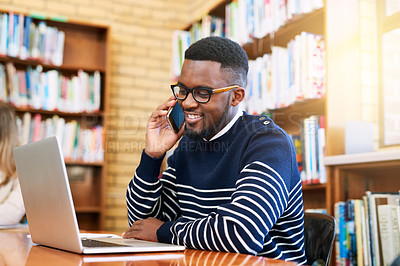 Buy stock photo Library, website and black man with phone call by laptop for communication, network and information. Campus, student and happy in discussion with tech for academy, college and reading online results