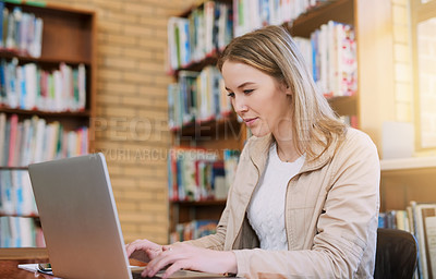 Buy stock photo Research, library and woman with laptop at university for education, communication or online course. Computer, reading and college student on website for study schedule, article or project planning