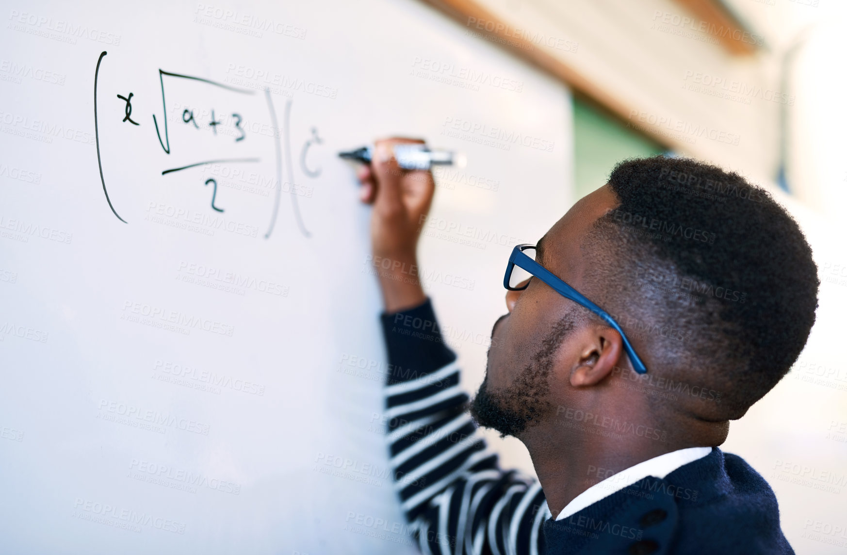 Buy stock photo Teaching, classroom and black man writing on whiteboard for math lesson, learning and examination. Education, university and teacher write equation for knowledge, assignment and studying in college