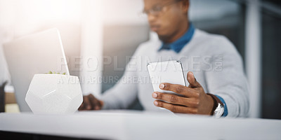 Buy stock photo Laptop, phone and hand of man in office for communication, networking or online research at tech startup. Computer, smartphone and businessman with internet, connection and career in web management