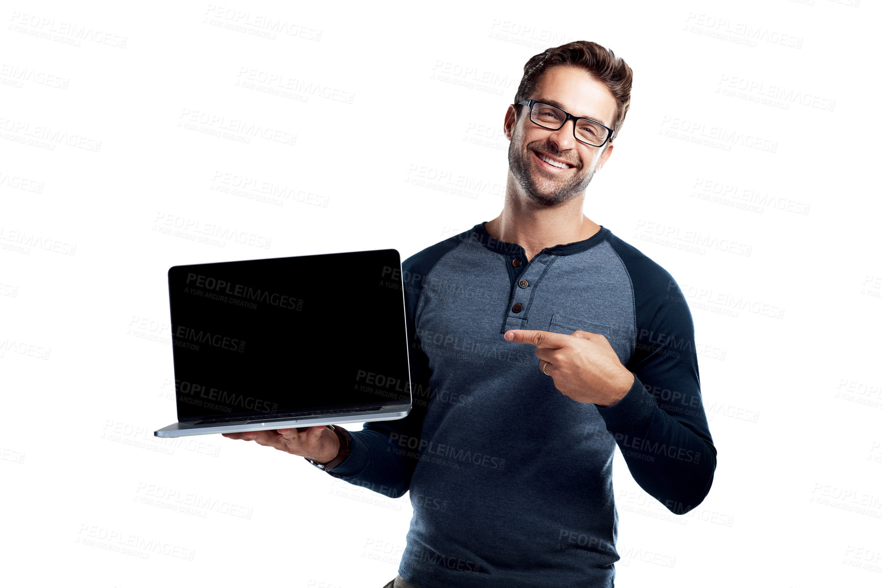 Buy stock photo Studio portrait of a handsome young man holding a laptop with a blank screen against a white background