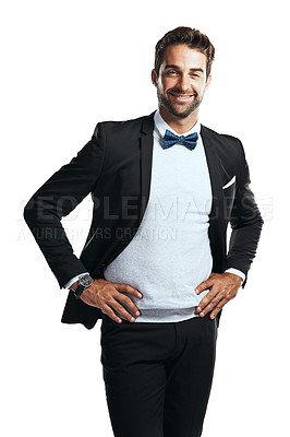Buy stock photo Studio shot of a handsome young man wearing a tuxedo against a white background