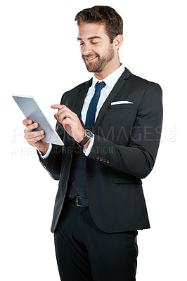 Buy stock photo Studio shot of a handsome young businessman posing against a white background