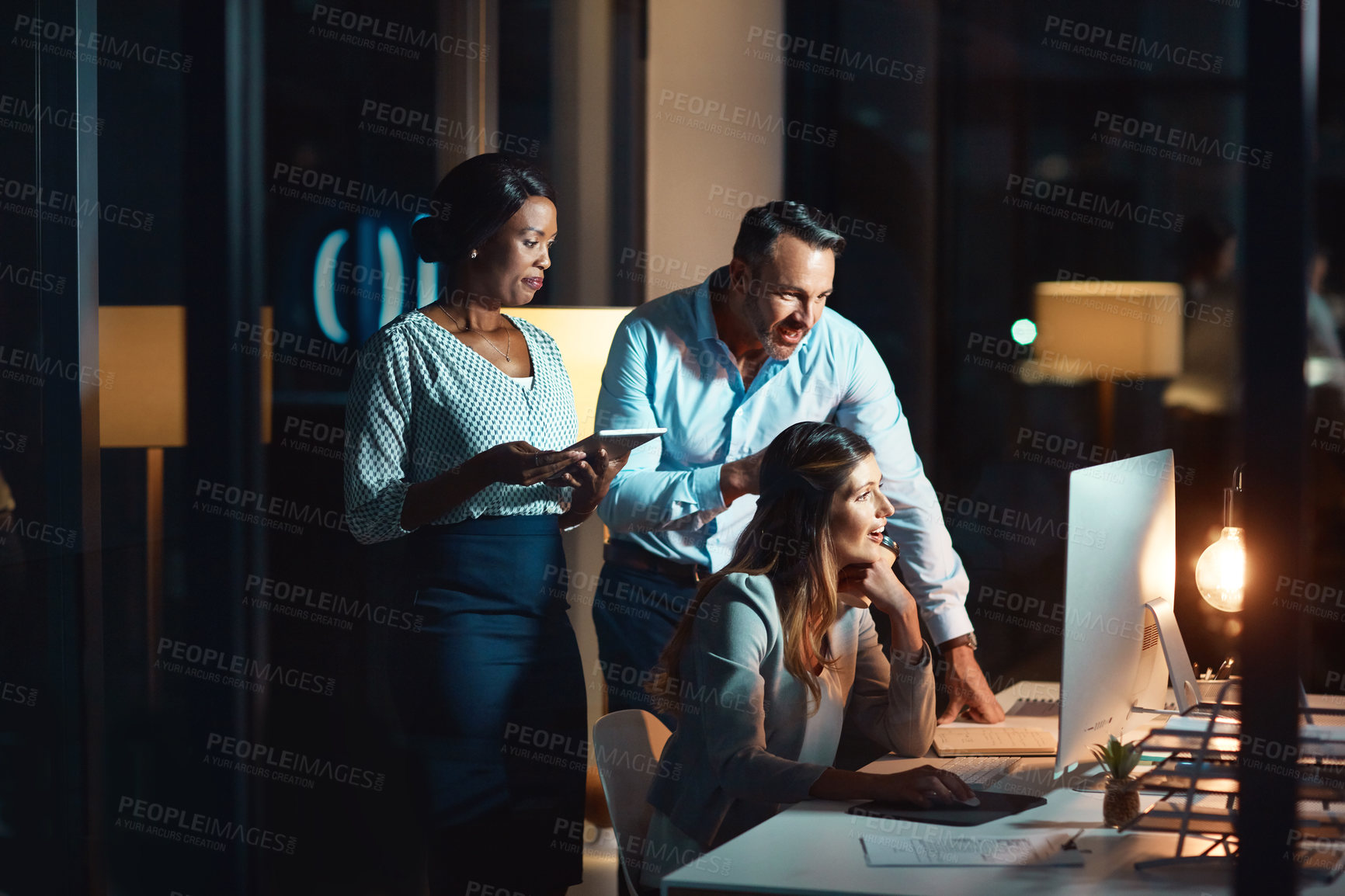 Buy stock photo Business people, thinking and night with computer for deadline, project or brainstorming design at office. Group of creative employees working late on technology for team or startup at workplace