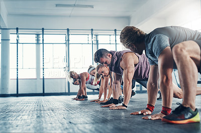 Buy stock photo Sports, stretching and group of people in gym for health, wellness and body workout. Team, warm up and personal trainer challenge with active routine for cardio exercise at class in fitness center