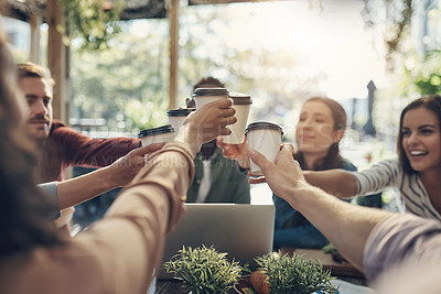 Buy stock photo Cropped shot of a group of creative employees toasting with coffee cups outside
