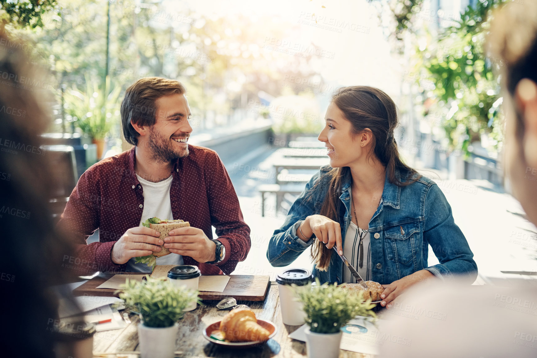 Buy stock photo Group of people, together and food at team building, meeting and table for gathering at cafe. Colleagues, celebration and break for lunch as staff, worker or employee at event in restaurant or bistro