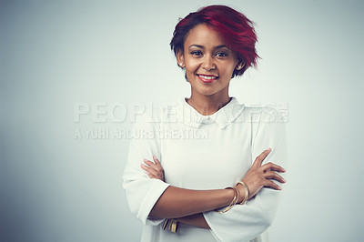 Buy stock photo African woman, portrait and hair care in studio for confidence, texture and cosmetics with red dye. Female person, happy and crossed arms on gray background for hairdresser, salon and transformation