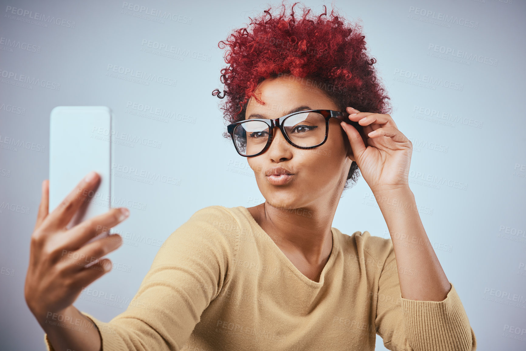 Buy stock photo Woman, selfie and glasses in studio for social media promo, photography and product review on white background. Funky influencer in new specs, vision and eye care for online post or profile picture