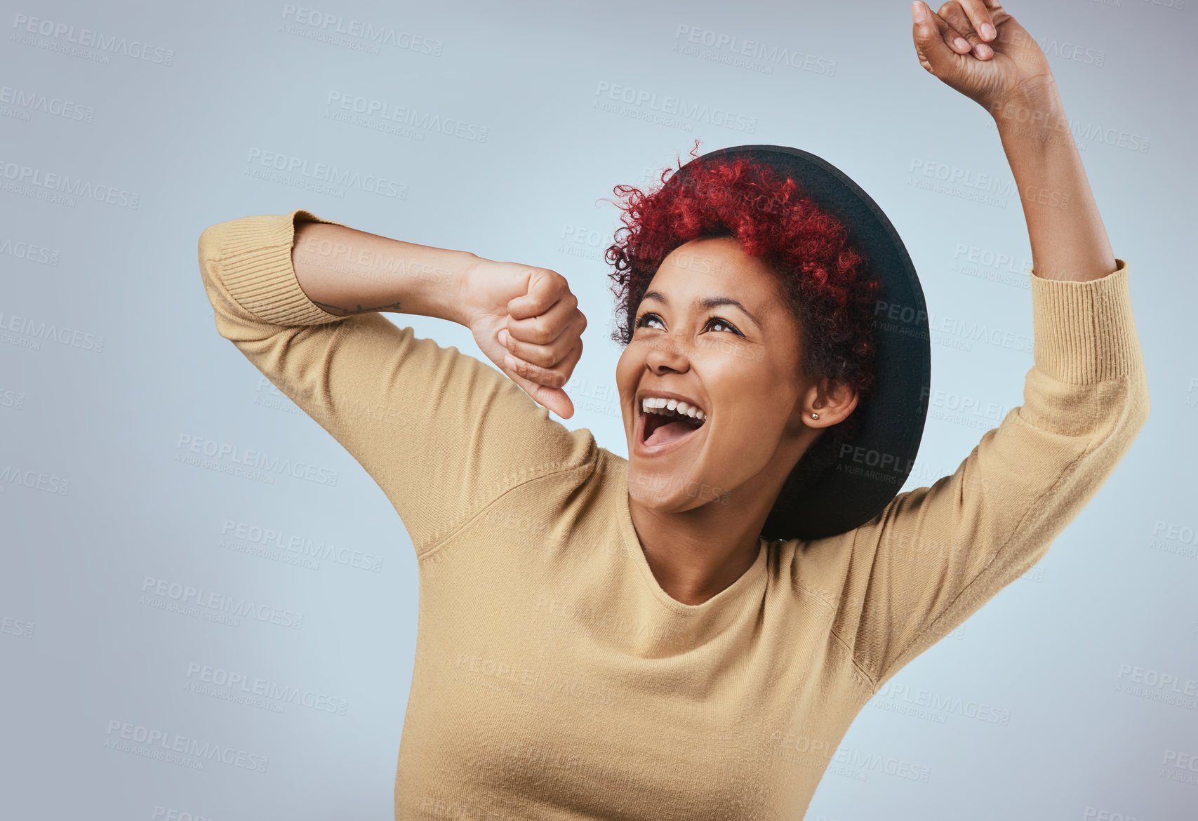 Buy stock photo Happy, woman and laughing with dancing hipster fashion and fun in studio, Smile, pop music and excited from celebration or motivation with minimalist style in grey background with carefree joy