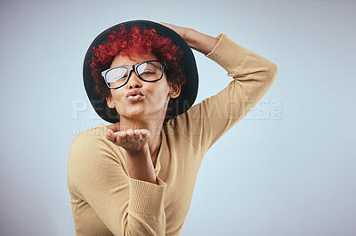 Buy stock photo Blowing kiss, flirt and portrait of woman in studio with style for emotion, love and emoji reaction. Redhead, glasses and isolated person with confidence, silly and positivity on white background