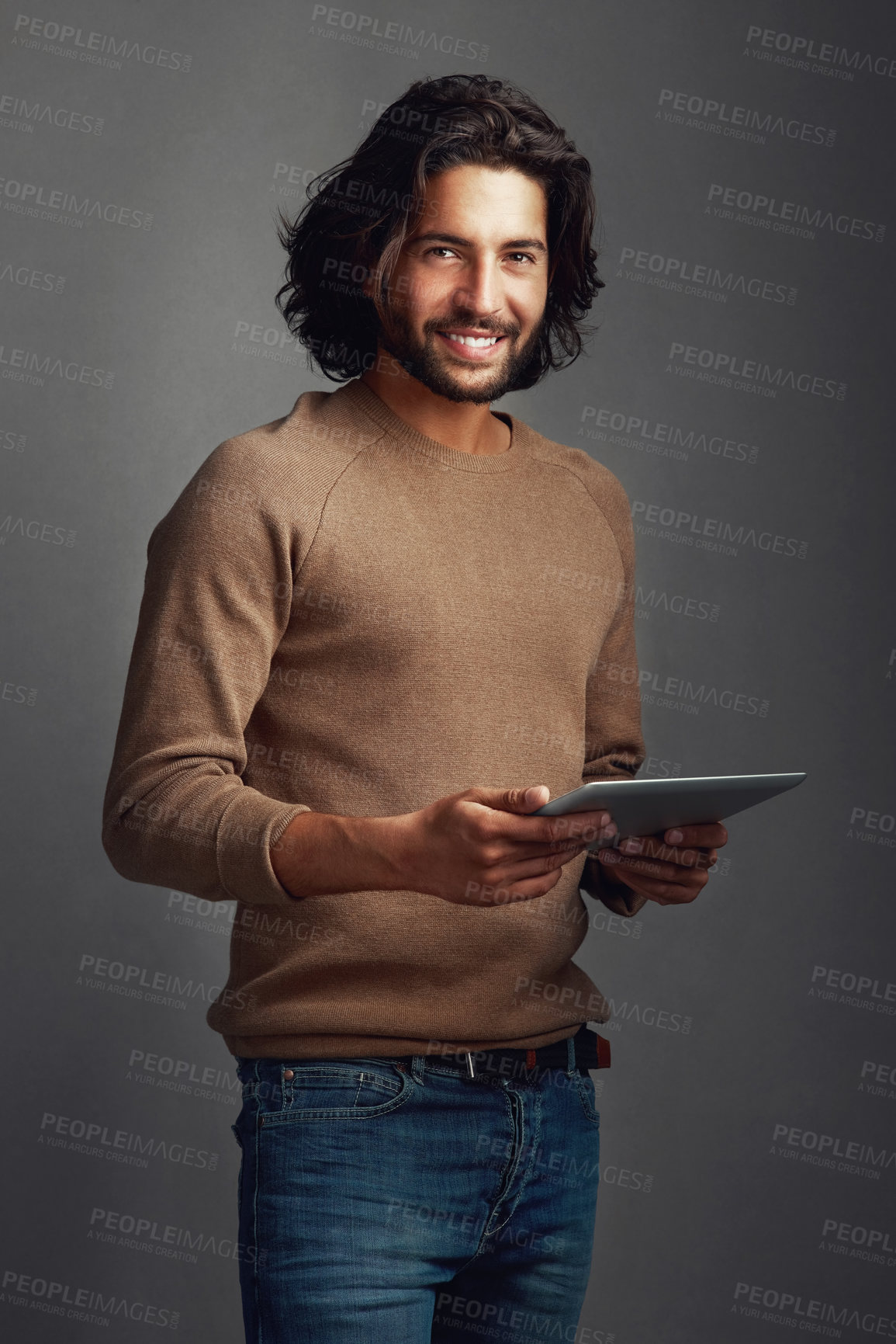 Buy stock photo Tablet, portrait and happy man in studio online for social media, dating app and email notification. Digital technology, scroll and person on website for fashion blog info isolated on gray background