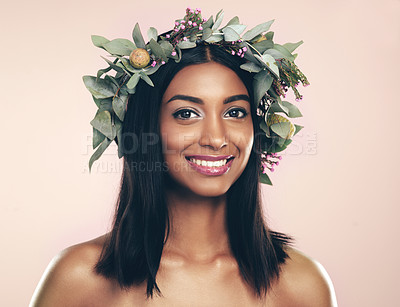 Buy stock photo Indian woman, portrait and flower wreath for natural beauty in studio on pink background, sustainability or eco friendly. Female person, face and organic skincare for wellness, cosmetic or mockup