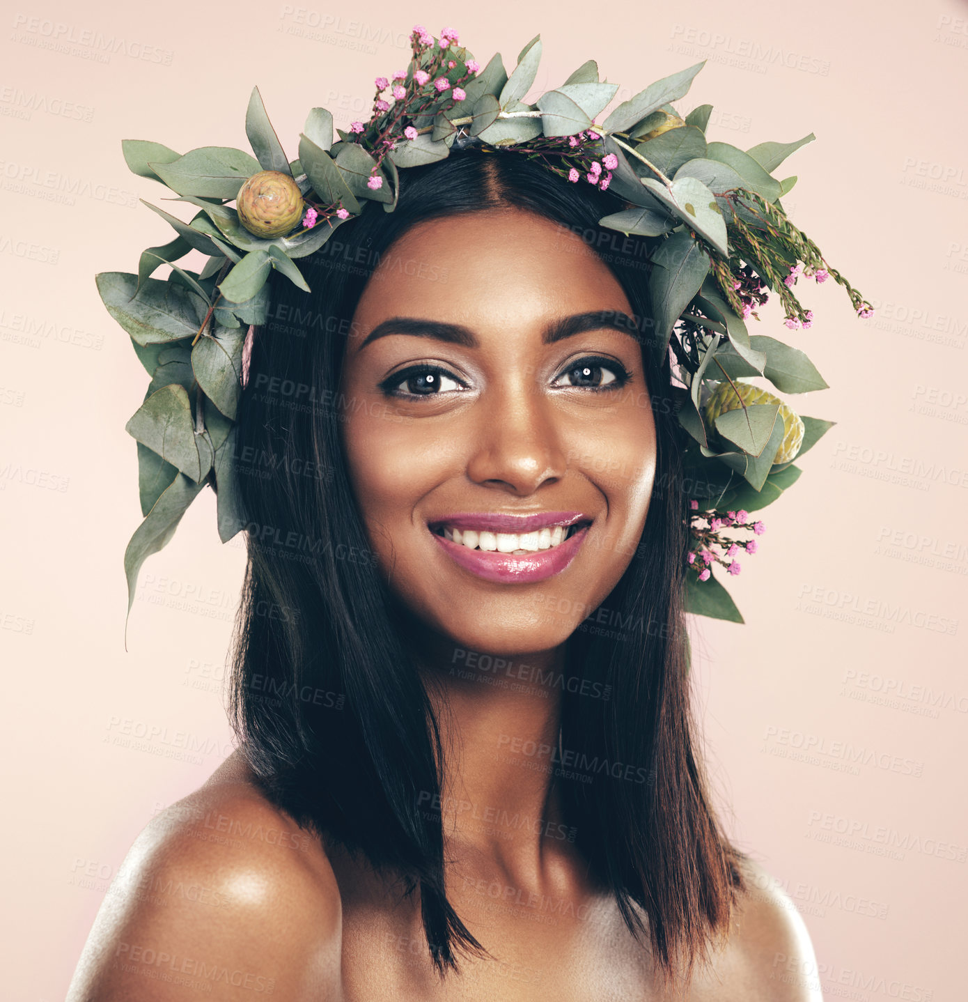 Buy stock photo Indian woman, portrait and flower wreath or makeup beauty in studio on pink background, sustainability or eco friendly. Female person, face and organic skincare for wellness, cosmetic or mockup space