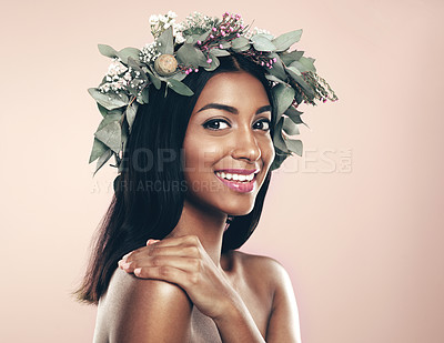 Buy stock photo Indian woman, smile and portrait with flower wreath or beauty on plant background, sustainability or eco friendly. Female person, face and organic skincare for makeup wellness, studio or mockup space