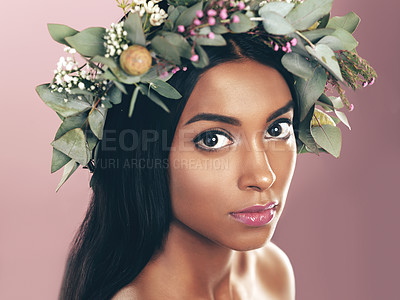 Buy stock photo Indian woman, portrait and flower or crown for beauty on pink background, sustainability or eco friendly. Female person, face and wreath for organic skincare or dermatology, studio or mockup space