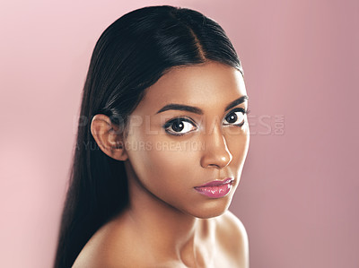 Buy stock photo Face portrait, skincare and woman in studio isolated on a pink background mockup. Natural beauty, serious and Indian female model with makeup, cosmetics and spa facial treatment for healthy skin.