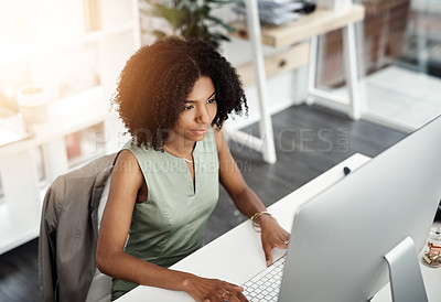 Buy stock photo African business woman, smile and computer in office for career, online digital report and web project. Editor or young person with tech and looking at screen for typing or internet with lens flare  