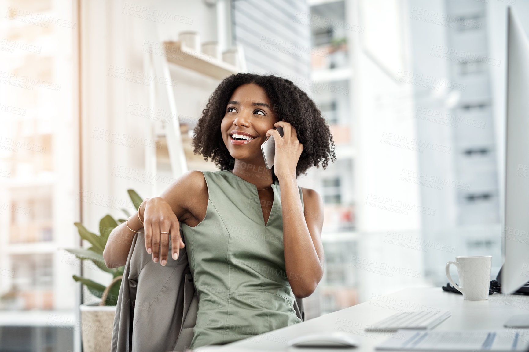 Buy stock photo Phone call, conversation and black woman in modern office for communication, tech and talking. African female designer, desktop and mobile discussion for client feedback, thinking and project ideas