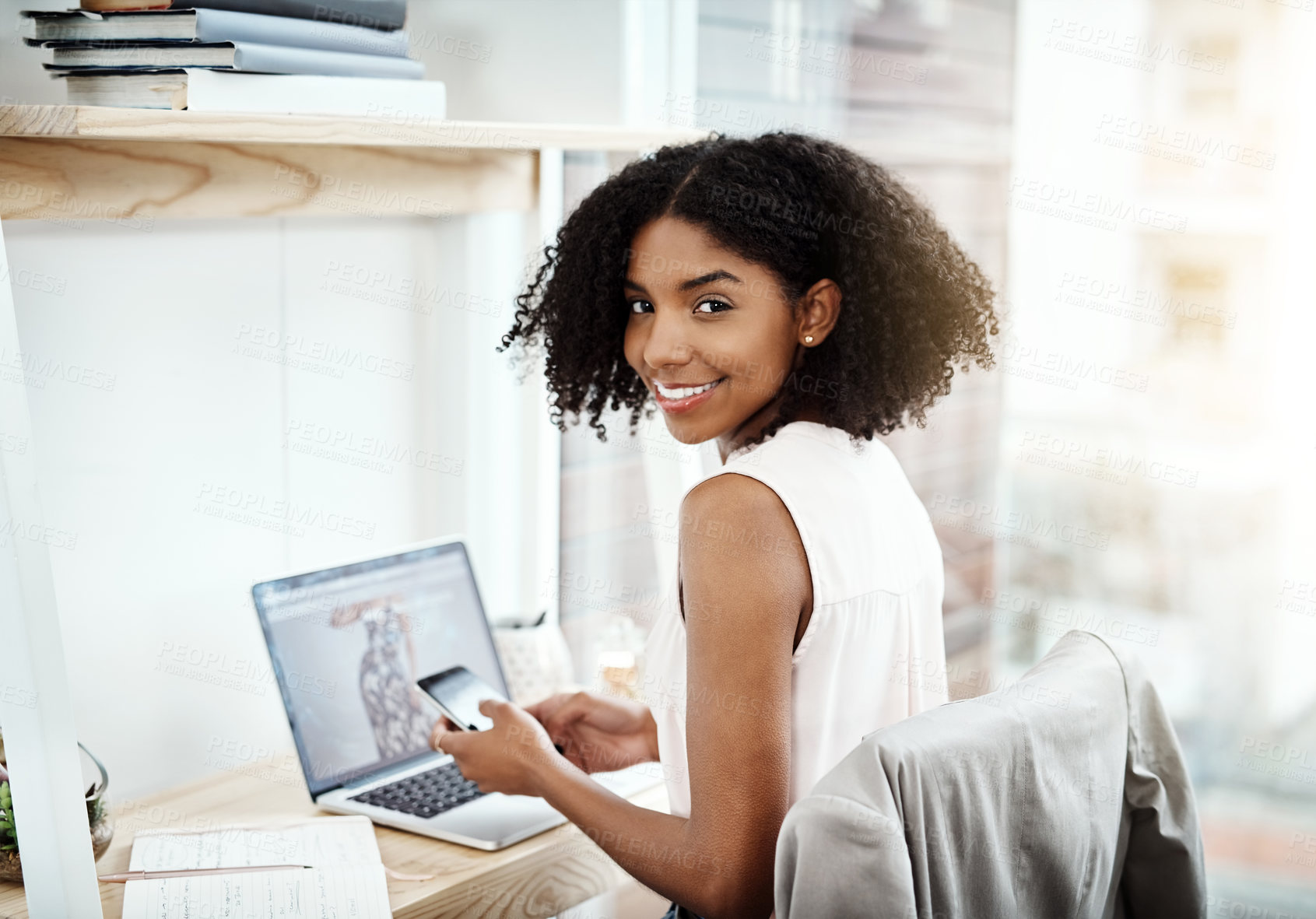 Buy stock photo Cropped portrait of an attractive young businesswoman working in her home office