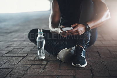 Buy stock photo City, phone and hands of man with fitness app for health, wellness and exercise tracking online. Smartphone, typing and athlete with water bottle on workout website, social media or relax on street