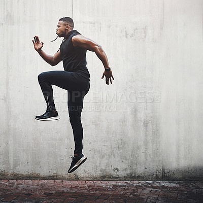 Buy stock photo Jump, fitness and black man running, speed and energy for cardio training, workout and sports wellness or body health. Athlete, runner or person exercise on concrete wall, action run or moving in air
