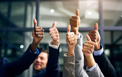 Buy stock photo Thumbs up with hands of a business team or group giving their approval, saying thank you or giving motivation together in their office at work. Corporate professionals supporting with trust
