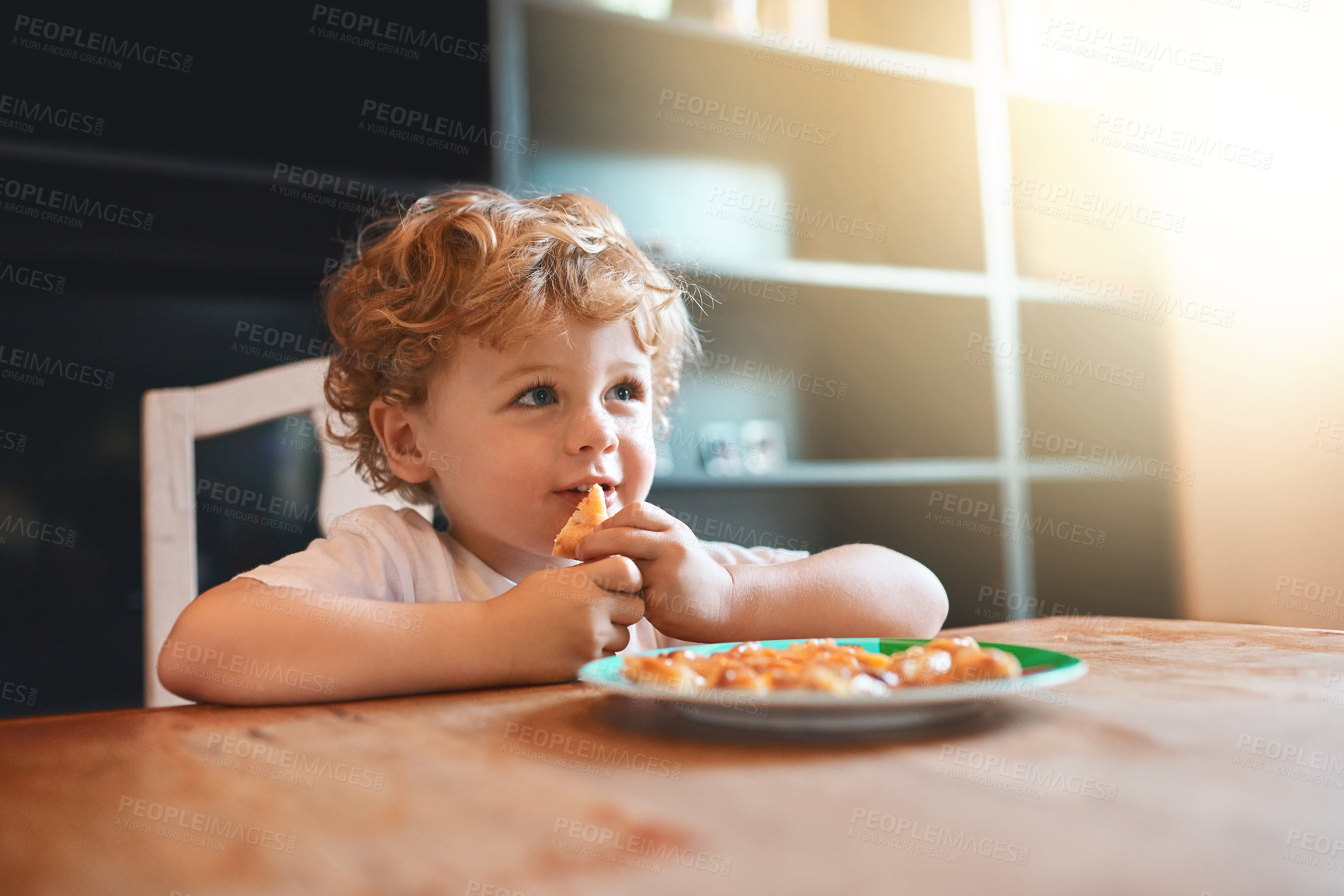 Buy stock photo Home, kid and boy eating lunch for healthy diet, nutrition and wellness in kitchen. Plate, hungry and child with food at table for childhood development, growth and meal for cute toddler with flare