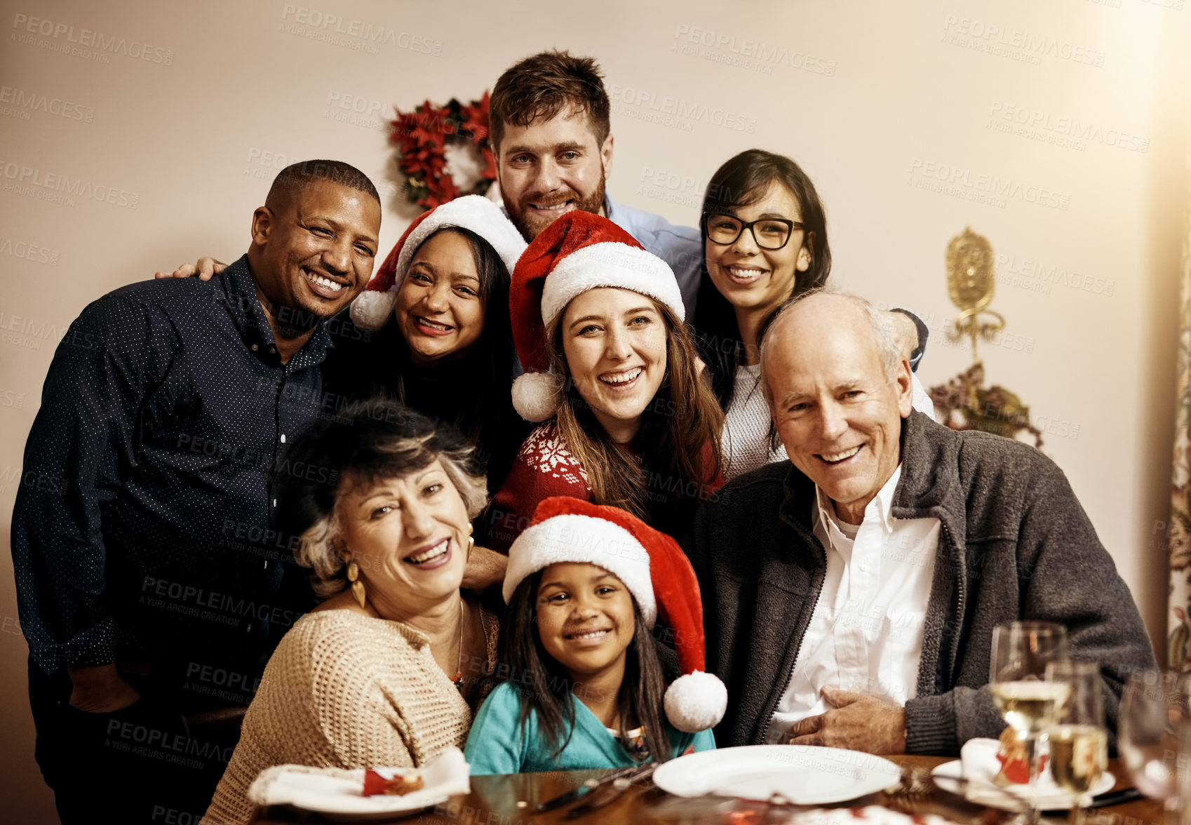Buy stock photo Portrait of a multi generational family celebrating Christmas together at home
