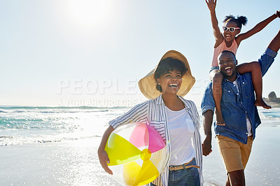 Buy stock photo Black family, beach ball and summer at the beach while happy and walking together holding hands. Man, woman and a girl child excited about holiday at the ocean with freedom, happiness and fun outdoor