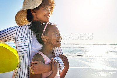 Buy stock photo Mother hug girl kid on beach, happy outdoor and ocean waves, lens flare and fun together in nature. Love, smile and black family on summer vacation, adventure with woman and child, sea view mockup