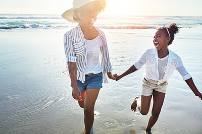 Buy stock photo Mother with girl kids holding hands on beach, happy outdoor and ocean waves, lens flare and fun together in nature. Laughing, black family on summer vacation and adventure, running woman and child 