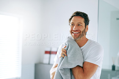 Buy stock photo Cropped shot of a handsome middle-aged man going through is morning routine in the bathroom