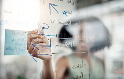 Buy stock photo Glass wall, hands and business woman writing, planning or strategy in office. Brainstorming, board and female person write ideas, working on project and schedule, analysis or information in workplace
