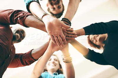 Buy stock photo Below, people and hand stack in office for business, creativity and collaboration. Employees, synergy and gesture in creative agency for community, inclusion and huddle for cooperation with trust