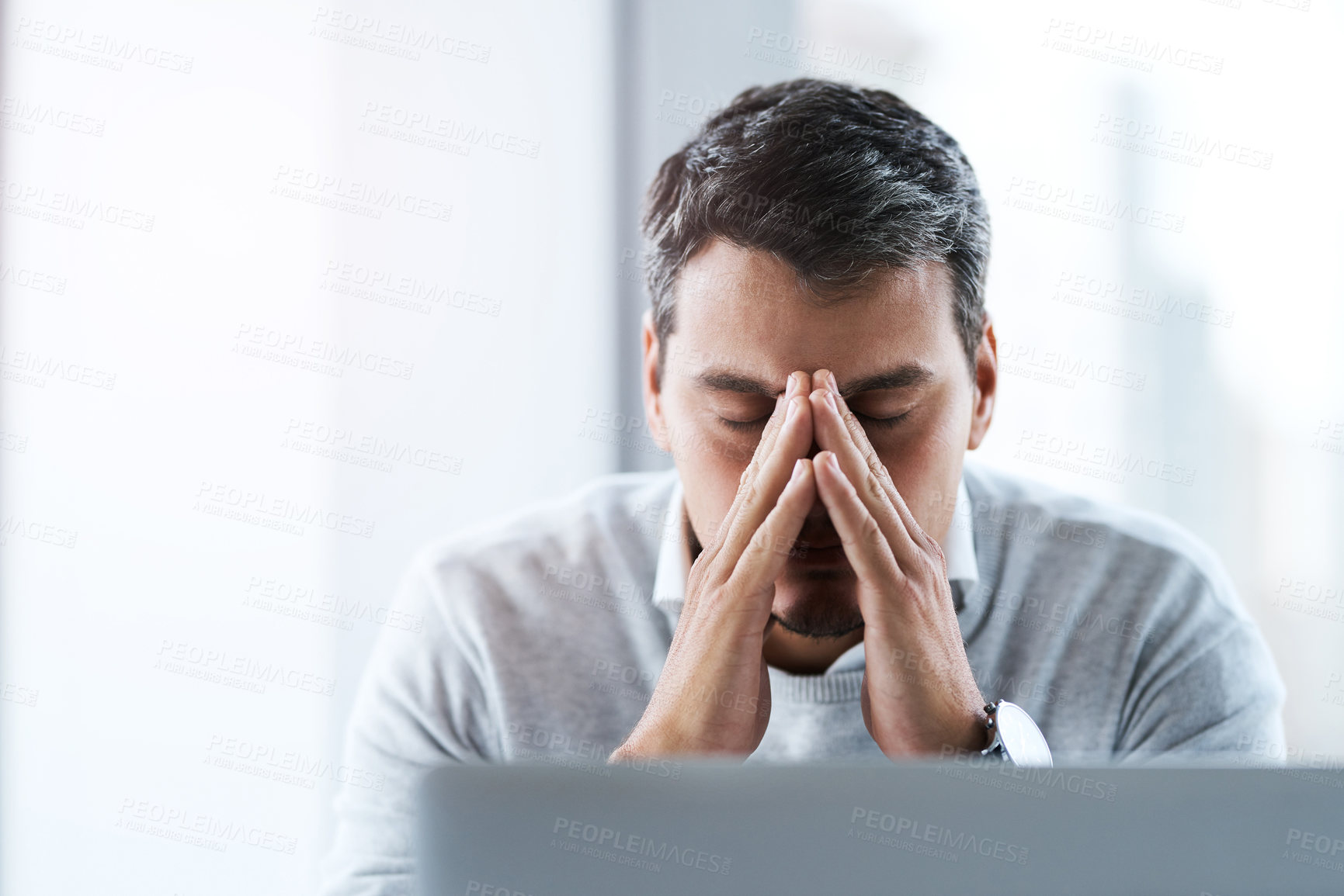 Buy stock photo Frustrated businessman, laptop and mistake with stress for bankruptcy, debt or financial crisis at office. Tired man, employee or trader with headache, pressure or strain for bad investment or loss