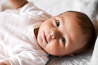 Buy stock photo Baby, portrait and boy on bed with relax for wellness, child development or comfortable in bedroom. Lying down, newborn and infant kid in nursery for curiosity, growth or morning routine in home